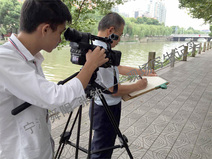 2015.09.23 接受南京依維柯車公司訪問時現(xiàn)場速寫余姚北濱江路街景